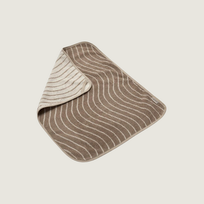 Leander dressing mat topper 
